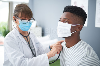 Buy stock photo Doctor, exam and woman with patient listening to heart, breathing or medical healthcare test for covid in hospital. Clinic, black man and corona mask or sick person, check health with stethoscope