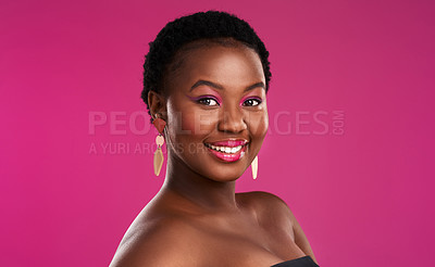 Buy stock photo Studio shot of a beautiful young woman posing against  a pink background