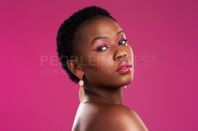 Buy stock photo Studio shot of a beautiful young woman posing against  a pink background