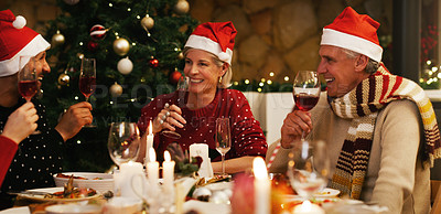Buy stock photo Christmas, dinner or happy family in home for food or eating on holiday together for bonding in social gathering. Man, woman or senior parents sharing feast with smile or wine to enjoy meal at night