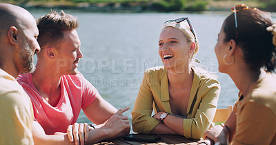 Buy stock photo Funny, friends and talking outdoor by sea for vacation, gossip and happy people bonding together. Group, smile and laughing at conversation at ocean in nature for holiday, travel or story in summer