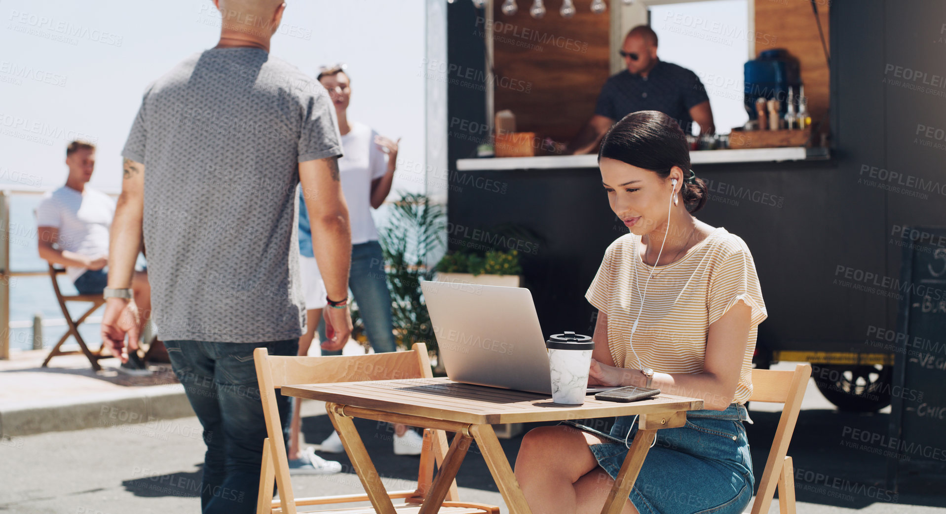 Buy stock photo Headphones, laptop and woman at outdoor cafe for remote work, networking or professional research. Earphones, computer and creative freelancer at coffee shop with music, streaming and online project