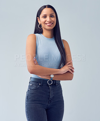 Buy stock photo Portrait, smile and fashion with woman, arms crossed or trendy clothes on grey studio background. Face, happy person or model with casual outfit or cheerful with gen z or confidence with mockup space