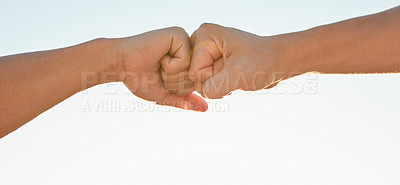 Buy stock photo Fist bump, sky and hands of people for support, agreement and collaboration outdoors. Friends, teamwork and closeup of greeting gesture for friendship, community and solidarity on sky background