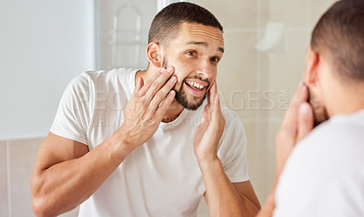 Buy stock photo Skincare, mirror and man in house with hands on face for beard, inspection or facial hair growth. Beauty, reflection and person with skin check in bathroom for cleaning, dermatology and self care