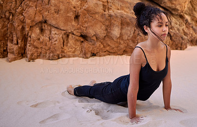 Buy stock photo Yoga, woman and stretching outdoor for fitness, wellness or mindfulness on sand relaxing. Sunset, zen and female person practicing pilates for strength training, mental health and physical wellbeing