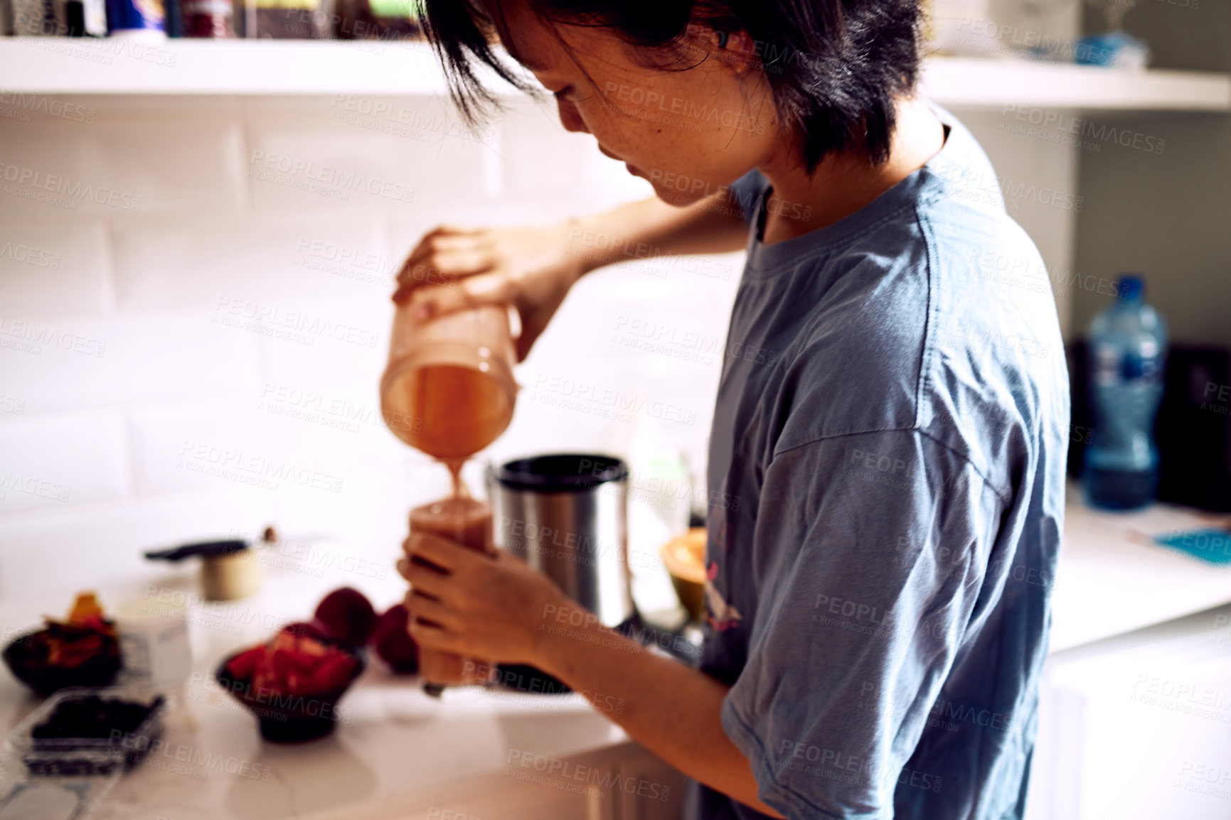 Buy stock photo Woman, face and smoothie in kitchen with pouring for healthy breakfast, morning routine and body detox. Person, meal prep and food mixer for organic drink, wellness and vegan diet on counter in home