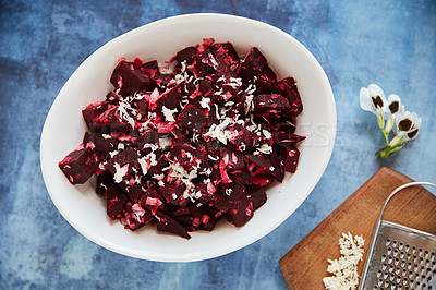 Buy stock photo Overhead shot of a roasted beetroot salad in a white serving bowl