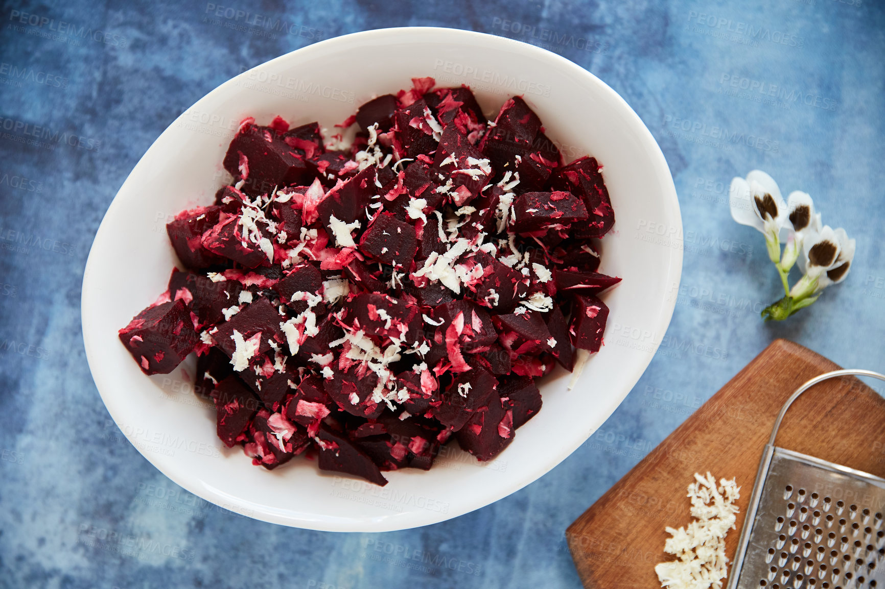 Buy stock photo Overhead shot of a roasted beetroot salad in a white serving bowl