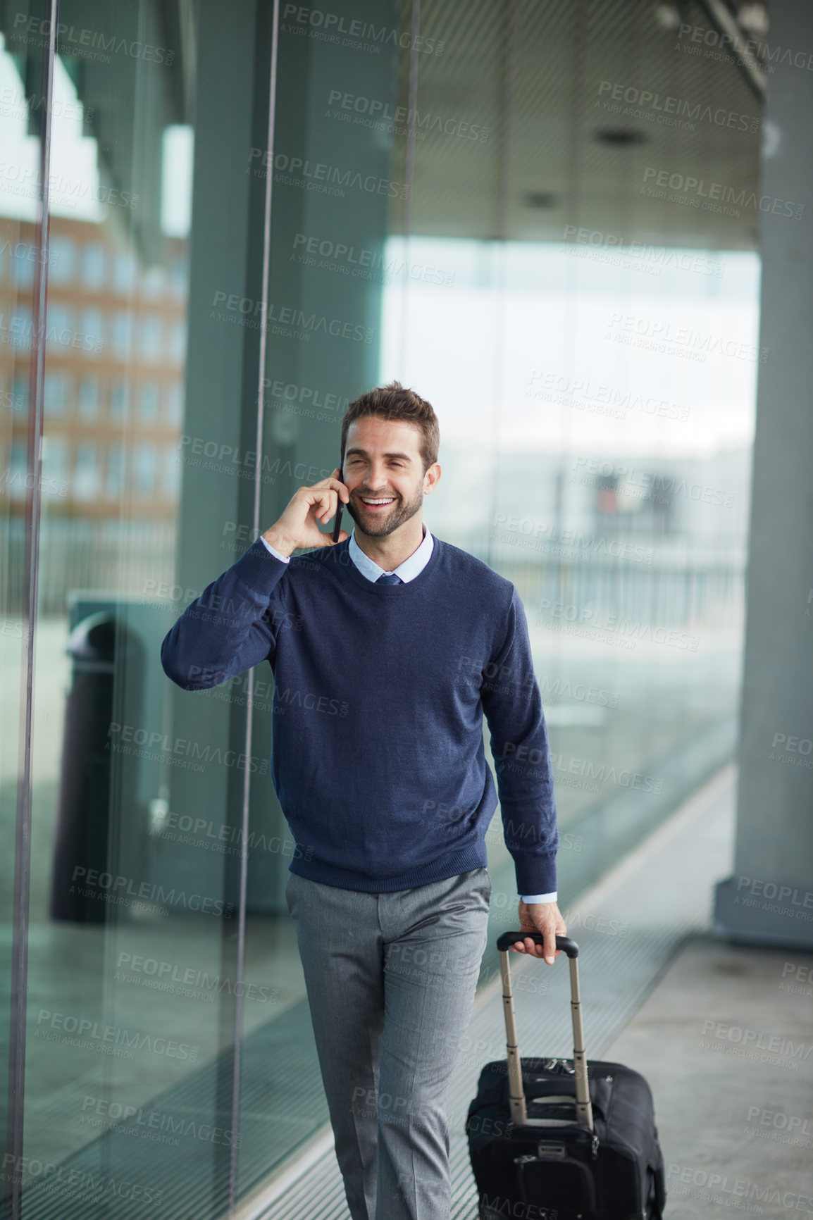 Buy stock photo Phone call, smile and man at terminal with luggage, flight schedule and contact notice. Communication, boarding pass and travel update with business person and suitcase with tech in airport lobby