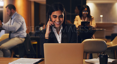 Buy stock photo Happy phone call, laptop and professional woman speaking, talk or negotiation with business investment contact. Coworking lounge, night consultant and person consulting, planning or chat on cellphone