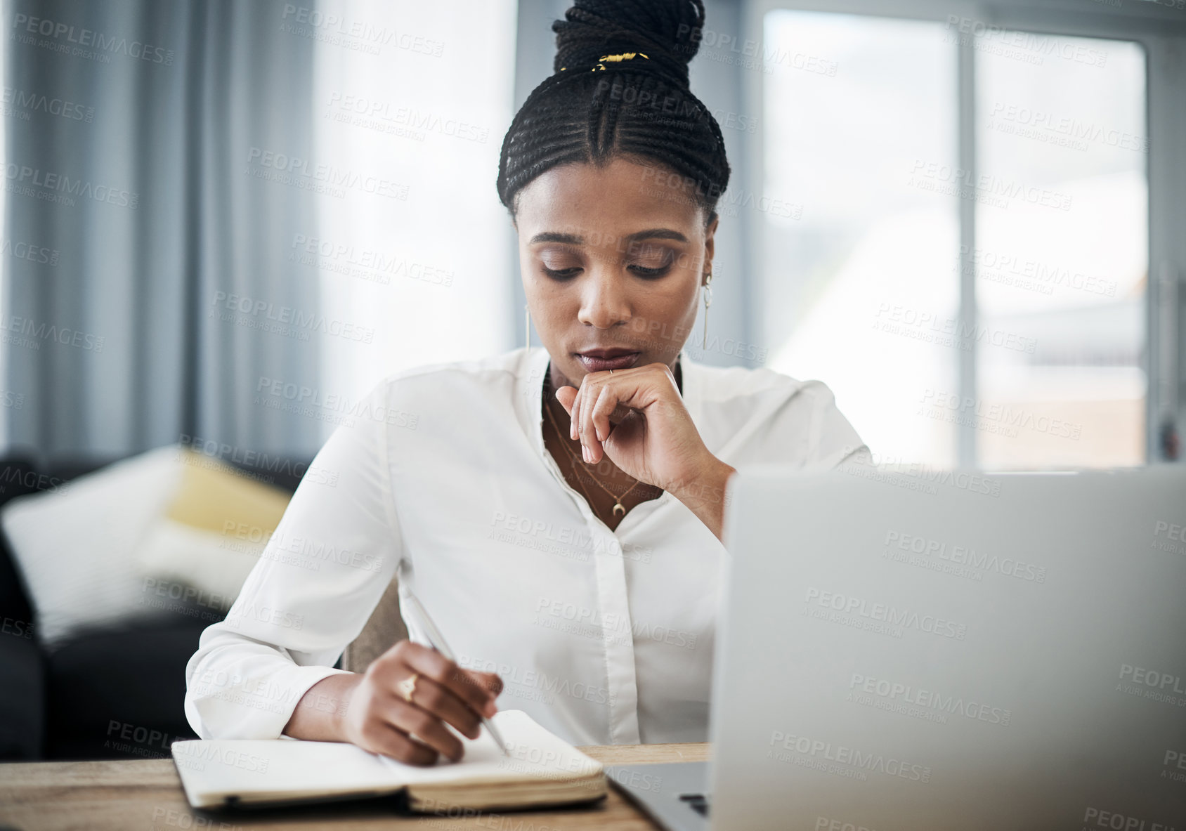 Buy stock photo Laptop, notebook and black woman writing in home for remote work with agenda, planning or calendar. Research, computer and African female virtual assistant with schedule, appointment or reminder task