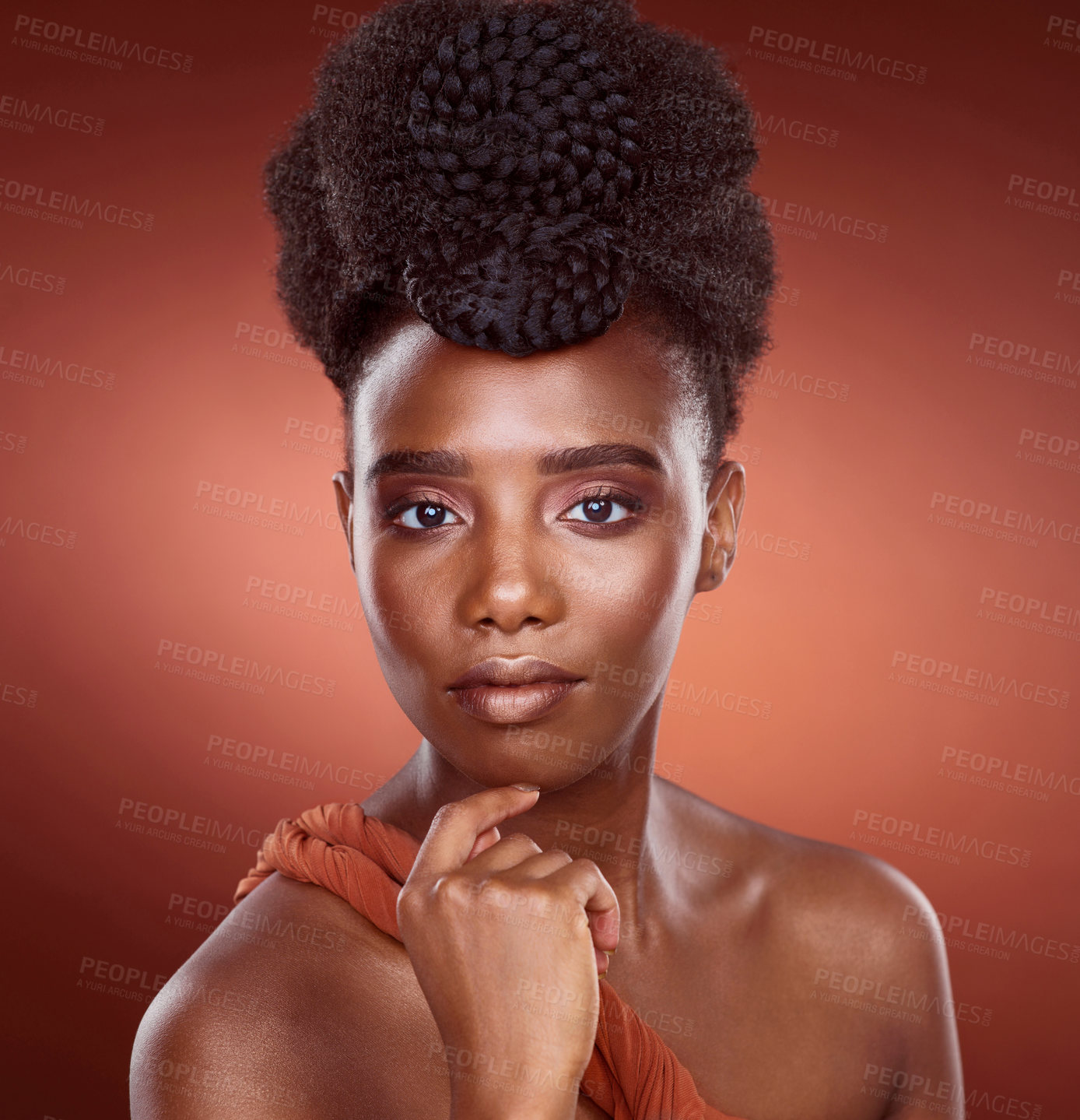 Buy stock photo Thinking, black woman and makeup in portrait or studio for beauty or glamour by red background. Pride, African and female person and cosmetic with foundation for glow or shine as model in Kenya