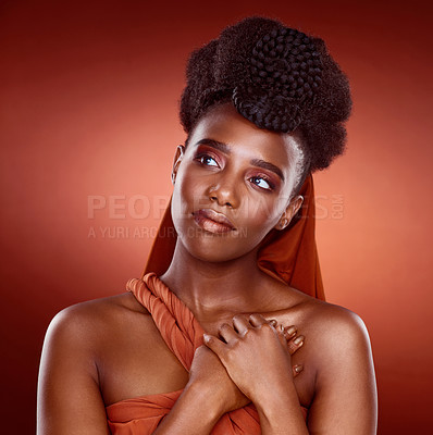 Buy stock photo Black woman, tradition and makeup for beauty or style in red background or fashion with volume or braids. African, female person and glow, trendy for design, glamour and confidence or pride in studio