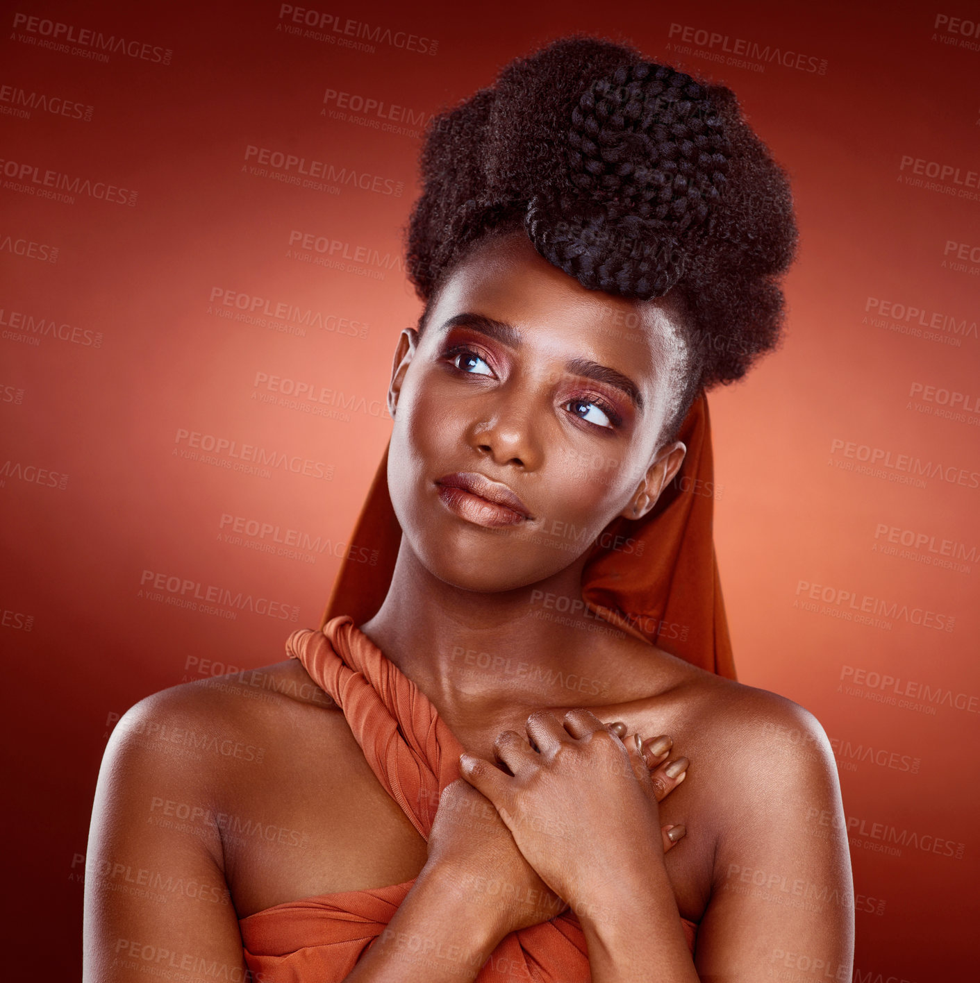 Buy stock photo Black woman, tradition and makeup for beauty or style in red background or fashion with volume or braids. African, female person and glow, trendy for design, glamour and confidence or pride in studio