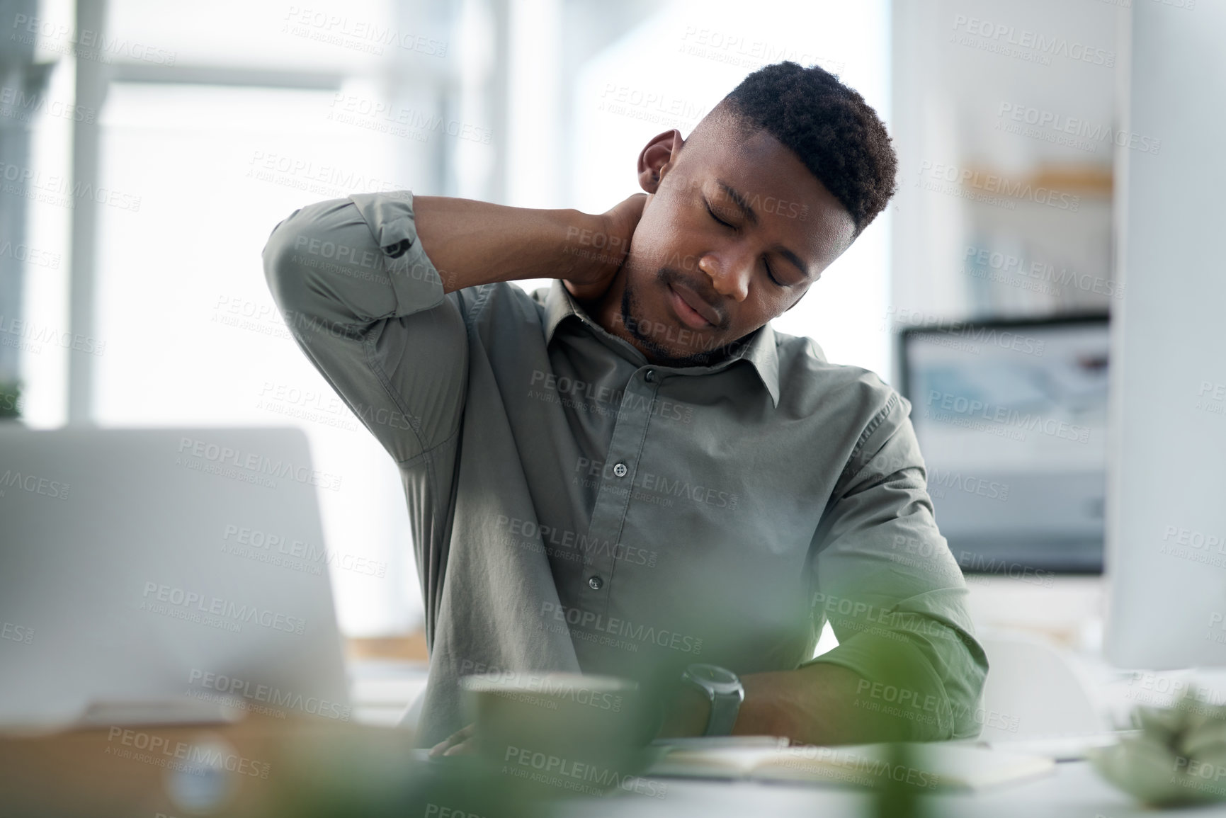Buy stock photo Black man, neck pain and stress in office from burnout, anxiety or overworked pressure and debt. Tired or frustrated African male person in fatigue, discomfort or joint injury at the workplace