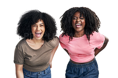 Buy stock photo Studio shot of two young women laughing against a white background