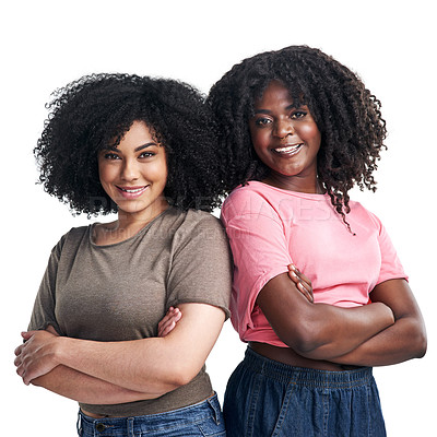Buy stock photo Studio portrait of two confident young women posing against a white background