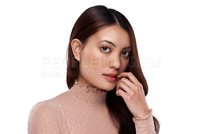 Buy stock photo Cropped portrait of an attractive young woman posing in studio against a white background
