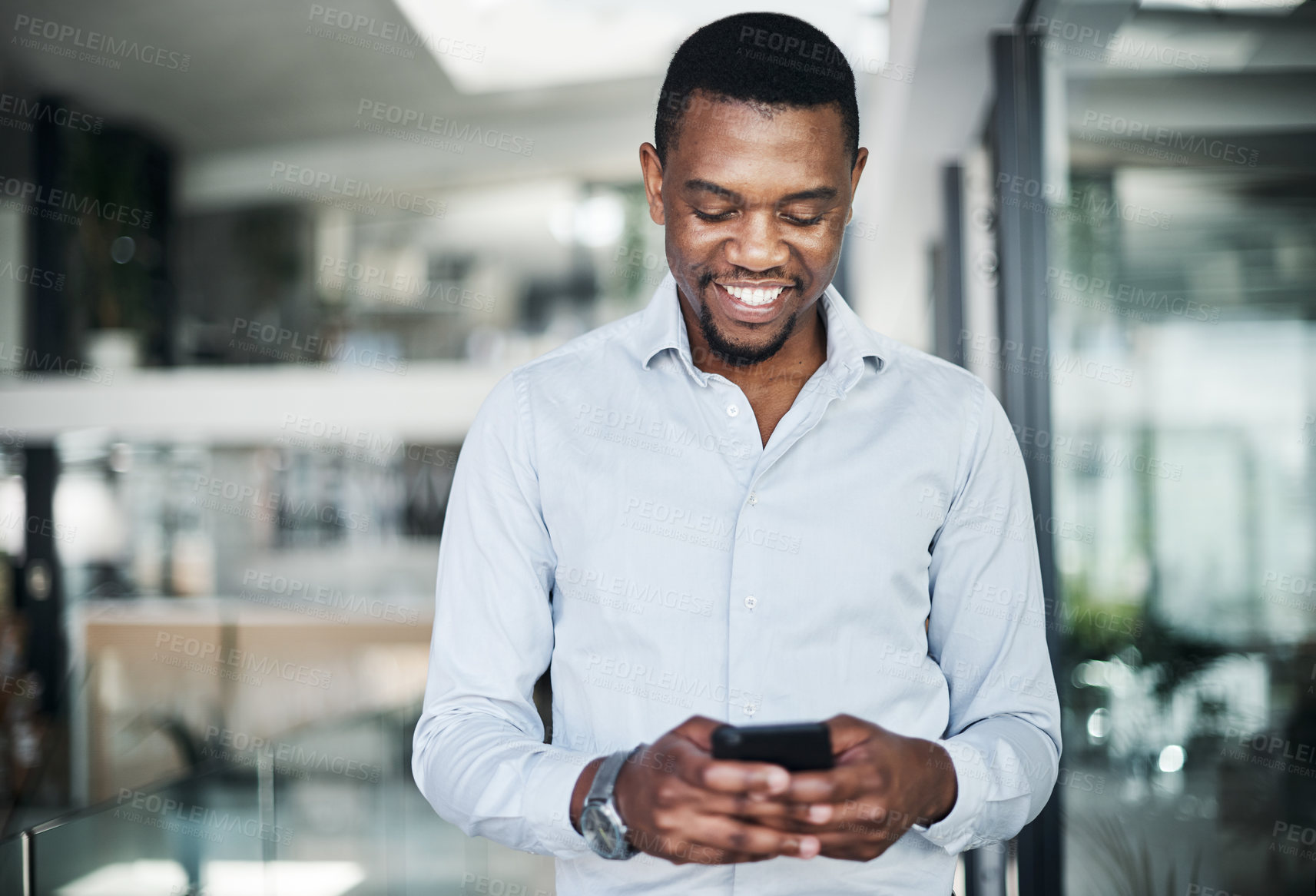 Buy stock photo Black man, phone and happy in office for communication, investment and business email with coffee. Human resources, technology and smile for recruitment, social networking and talent acquisition