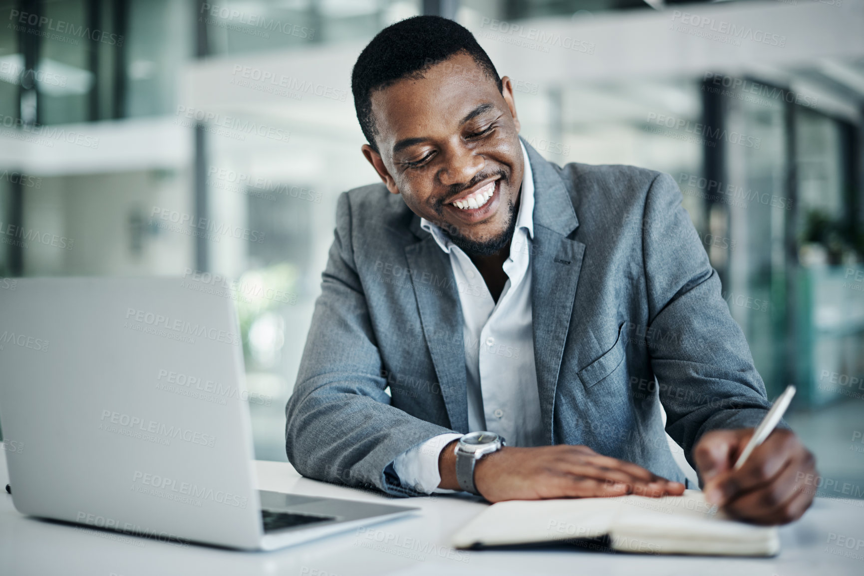 Buy stock photo Black man, laptop and notebook for planning in office, online research and writing notes for tasks. Male person, receptionist and planner to schedule agenda, journal and reminder to email client