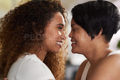 Buy stock photo Shot of an affectionate couple spending quality together at home