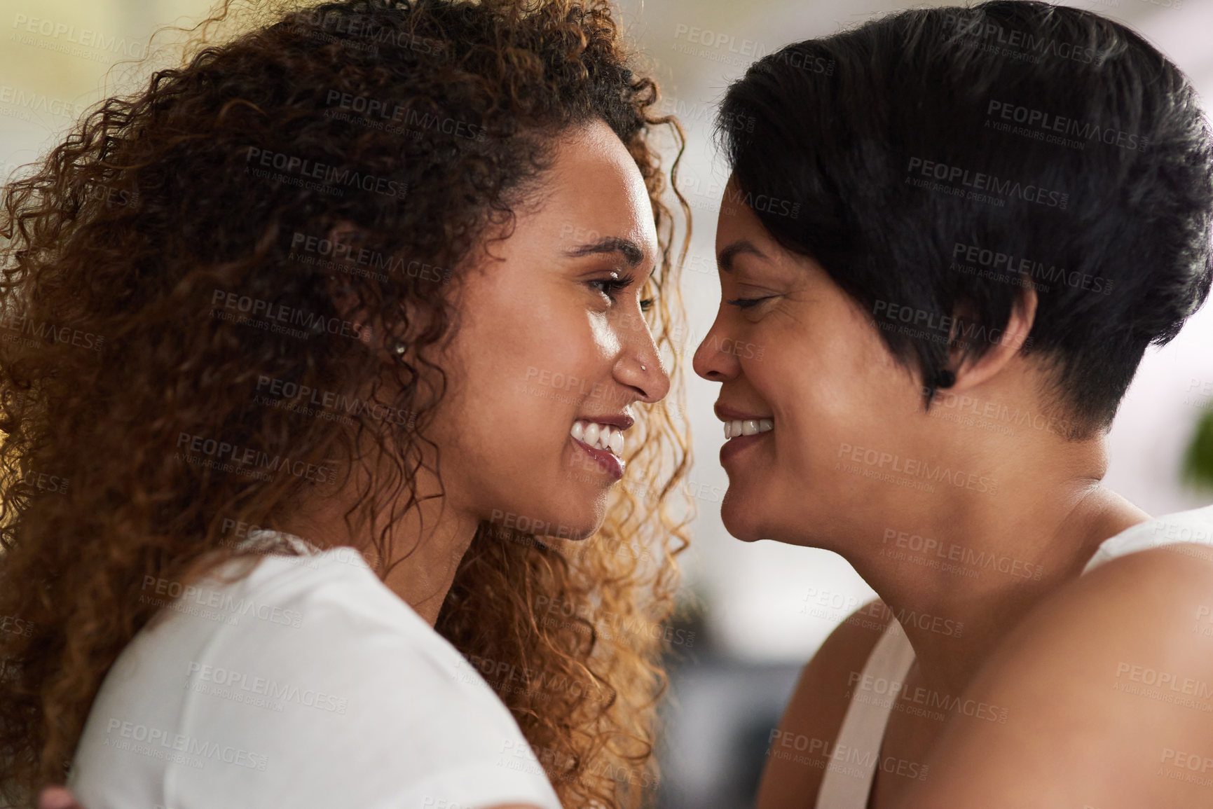 Buy stock photo Shot of an affectionate couple spending quality together at home