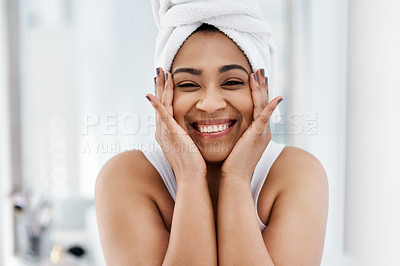 Buy stock photo Shot of a young woman going through her beauty routine at home