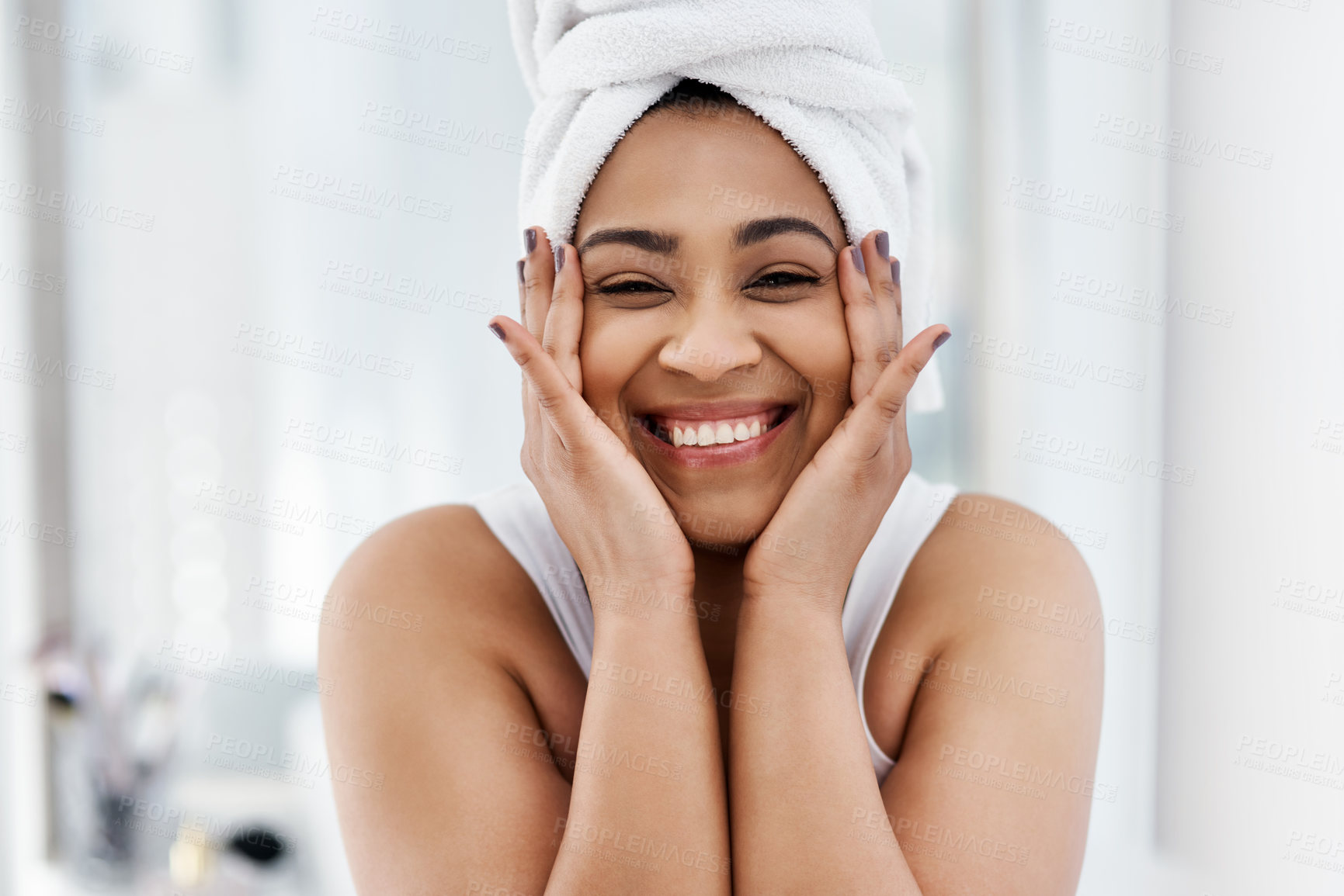 Buy stock photo Shot of a young woman going through her beauty routine at home