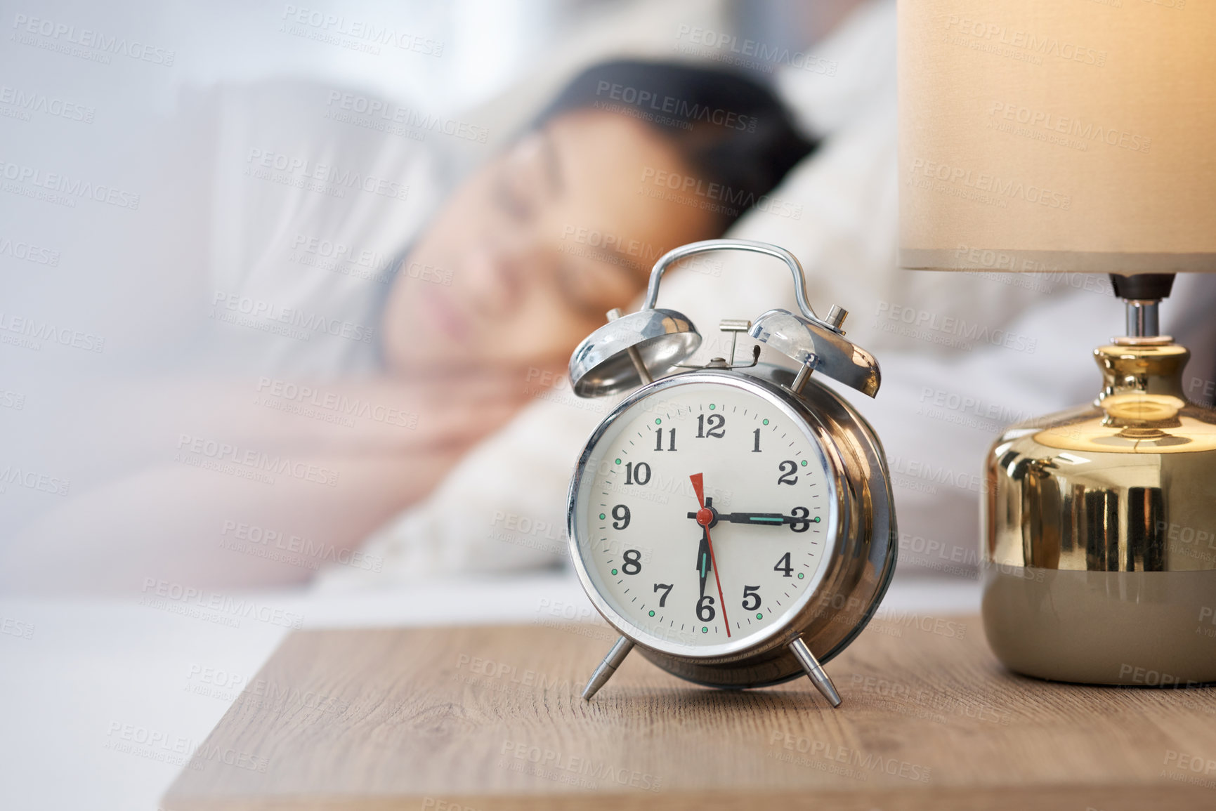 Buy stock photo Shot of a young woman in bed at home