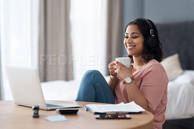 Buy stock photo Shot of a young woman working from home