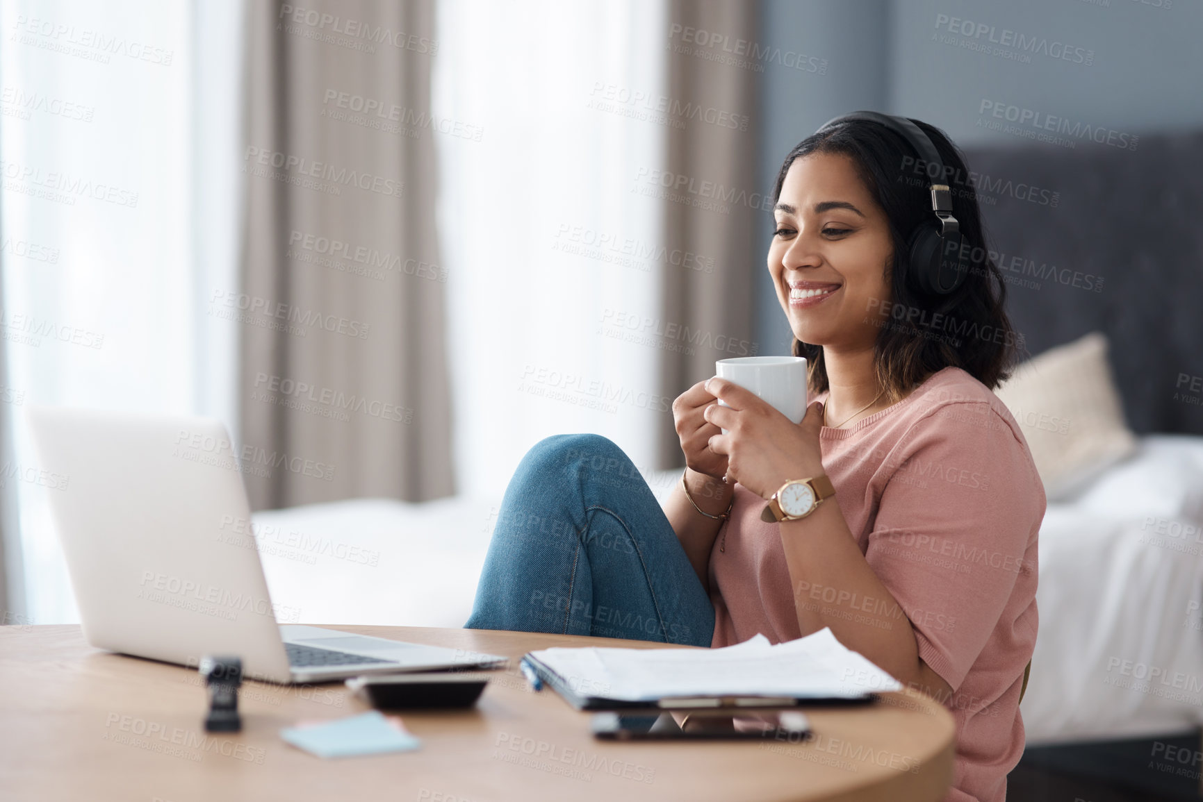 Buy stock photo Shot of a young woman working from home