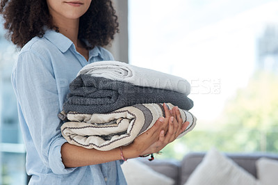 Buy stock photo Clean laundry, holding and hands with towels from the wash for the house and fresh linen. Cleaner, organize and a woman with clothes in an apartment, packing and organizing clothing for routine