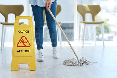 Buy stock photo Shot of an anonymous woman mopping her floors at home