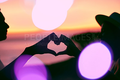 Buy stock photo Sunset, bokeh and silhouette of couple with heart hands, emoji and light on romantic outdoor date. Love sign, man and woman with care, affection and relationship support on evening travel holiday.