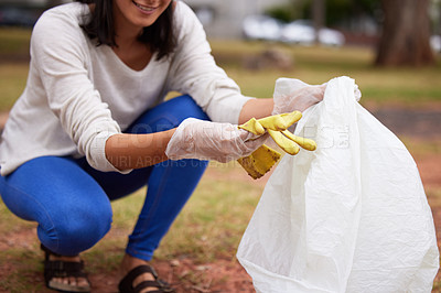 Buy stock photo Sustainability, pollution and woman cleaning a park for earth day, eco friendly and ecology in Costa Rica. Recycle, charity and volunteer picking up trash for service, clean energy and work in nature