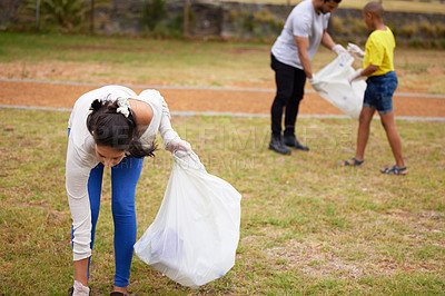 Buy stock photo Community volunteer, garbage and people cleaning trash, pollution or waste product for environment support. Plastic recycling, NGO charity and eco friendly person helping with nature park clean up