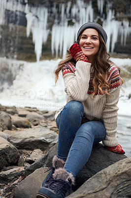 Buy stock photo Full length shot of an attractive young woman spending the day outside during winter