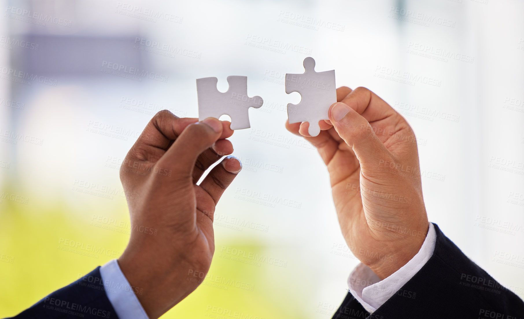 Buy stock photo Hands, puzzle and people for business solution with connection, synergy or integration at agency. Teamwork, toys and creativity for problem solving, strategy or link with ideas for vision at company