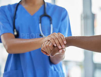 Buy stock photo Nurse, holding hands and patient with support, help and grief consulting after cancer news. Hospital, healthcare and clinic worker with person supporting with guidance and advice from health results