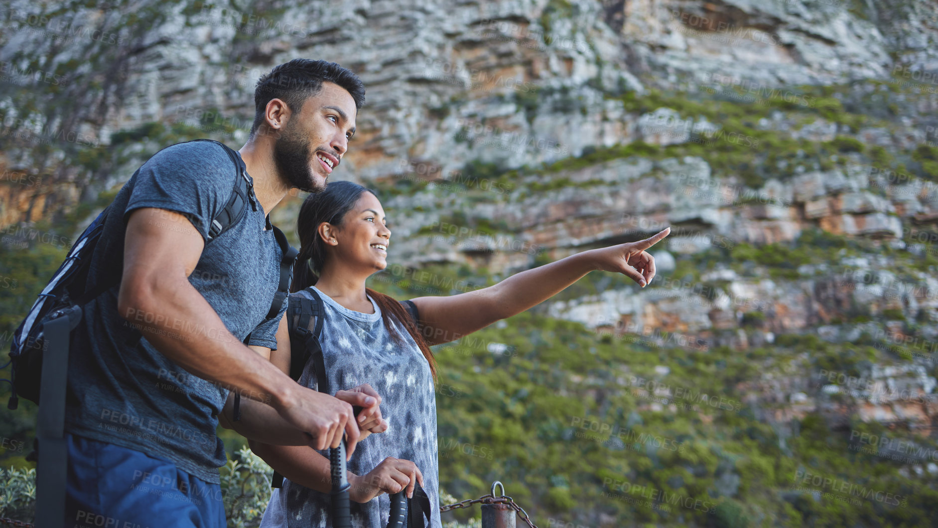 Buy stock photo Couple, happy and pointing to mountain for hiking in forest with backpack, adventure and morning workout for summer fitness. People, trail walk and exercise, training and explore in nature for cardio