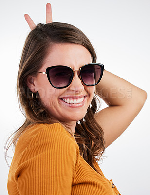 Buy stock photo Peace sign, sunglasses and smile portrait with woman and happy with emoji, excited and hand gesture in studio. University student and modern fashion with clothes and confidence with white background