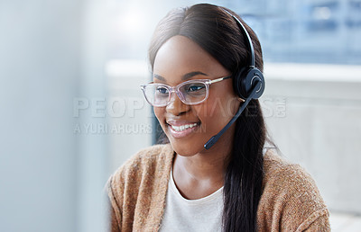 Buy stock photo Shot of a businesswoman sitting at her desk in a call center office
