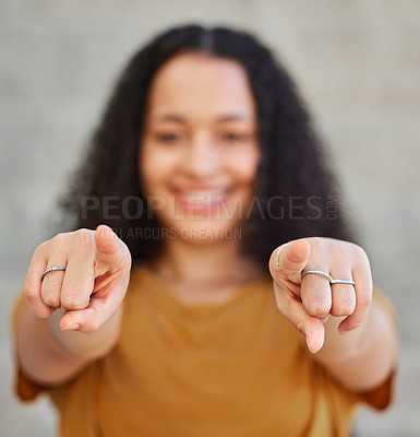 Buy stock photo Cropped shot of a young woman pointing at the camera