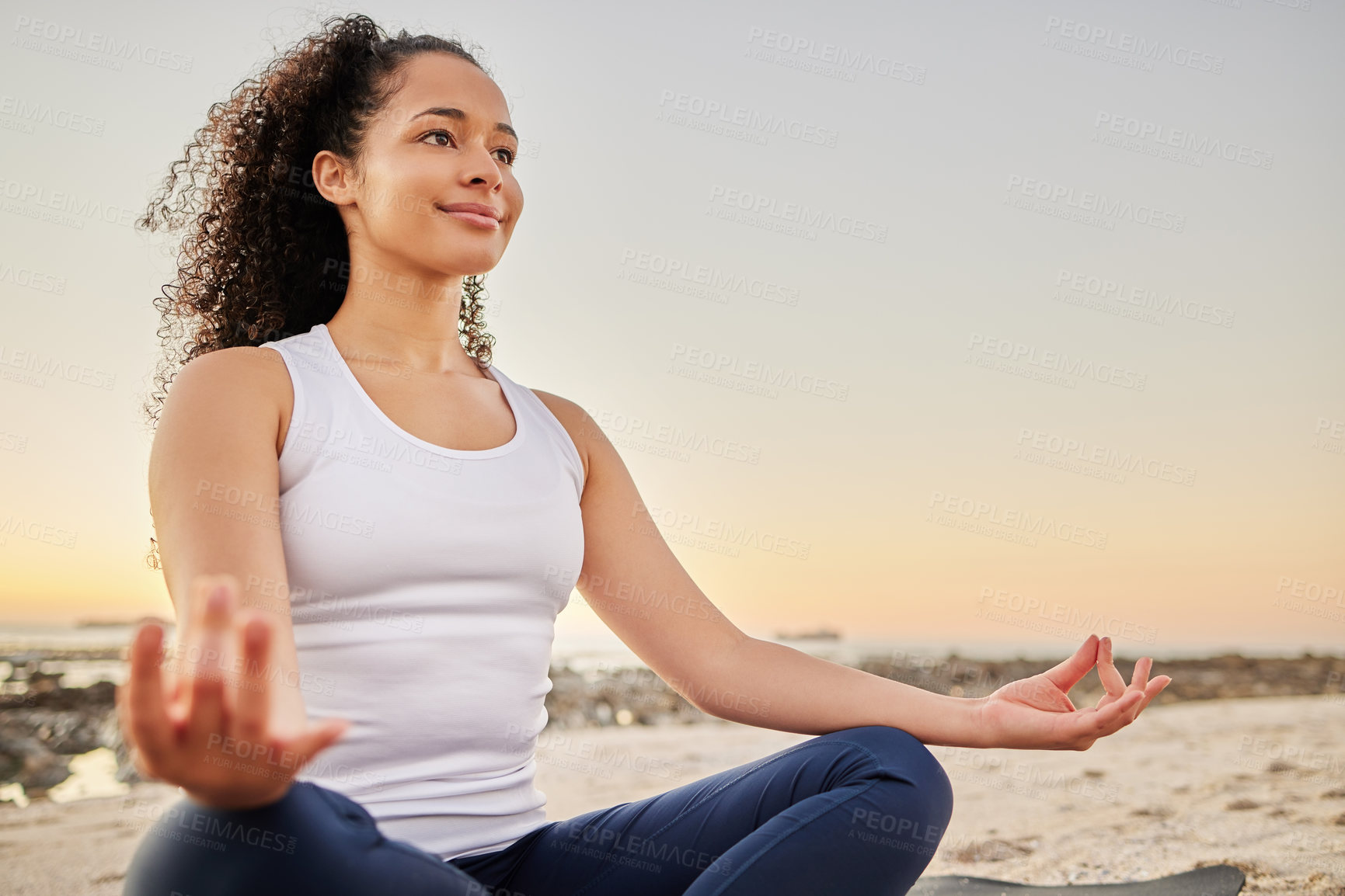 Buy stock photo Woman, beach and smile with meditation for peace or zen, calm and wellbeing or wellness in Los Angeles. Female person, outdoor and mat for mental health, mindset and relaxation for stress relief.