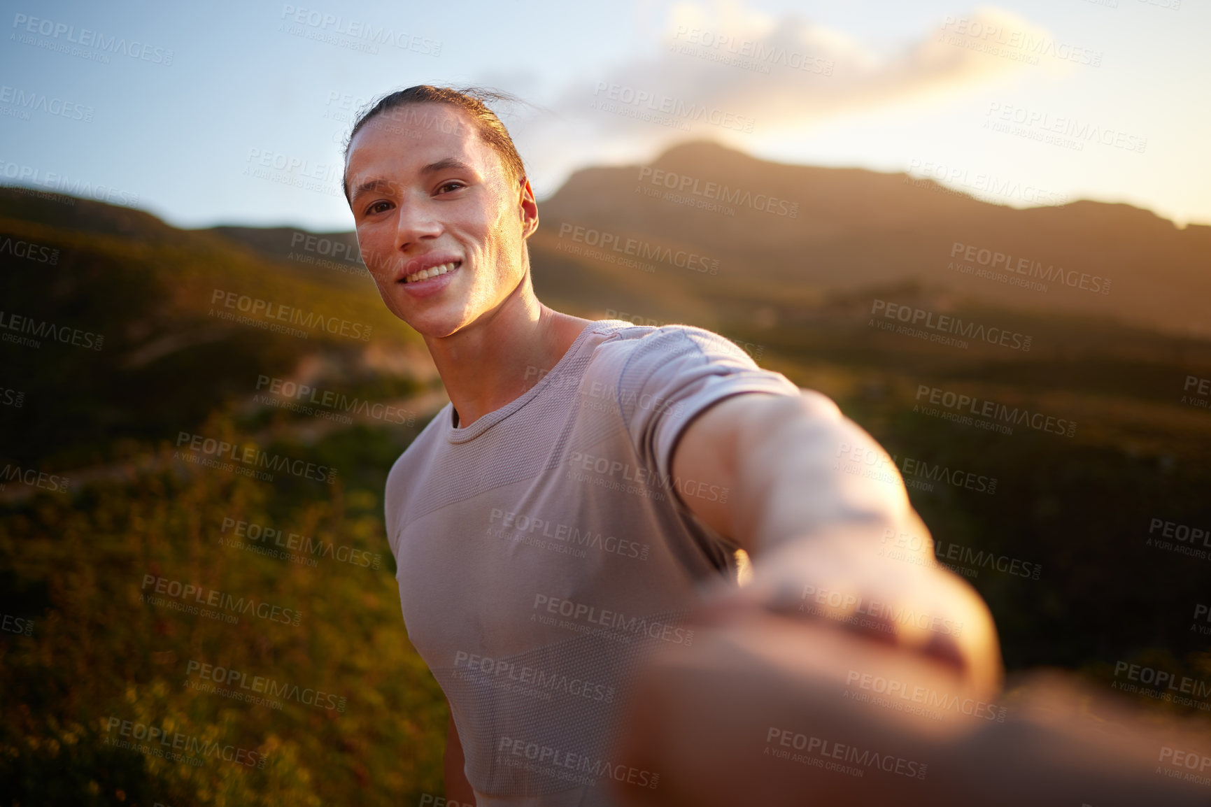 Buy stock photo Shot of a young man taking a break during his workout