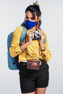 Buy stock photo Shot of a woman wearing a mask while exploring