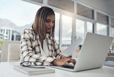 Buy stock photo Business analyst, laptop and woman typing documents in office workplace. Paperwork analysis, computer and female Indian person reading analytics for data, graphs or charts for finance statistics.