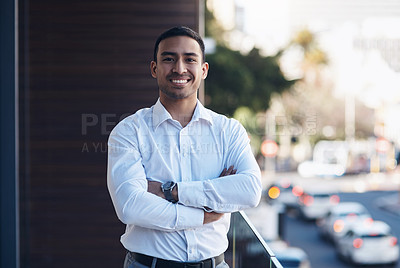 Buy stock photo Portrait, business and man with arms crossed, smile and confident guy with happiness, startup success and office balcony. Face, male person and employee with a career, entrepreneur and professional 