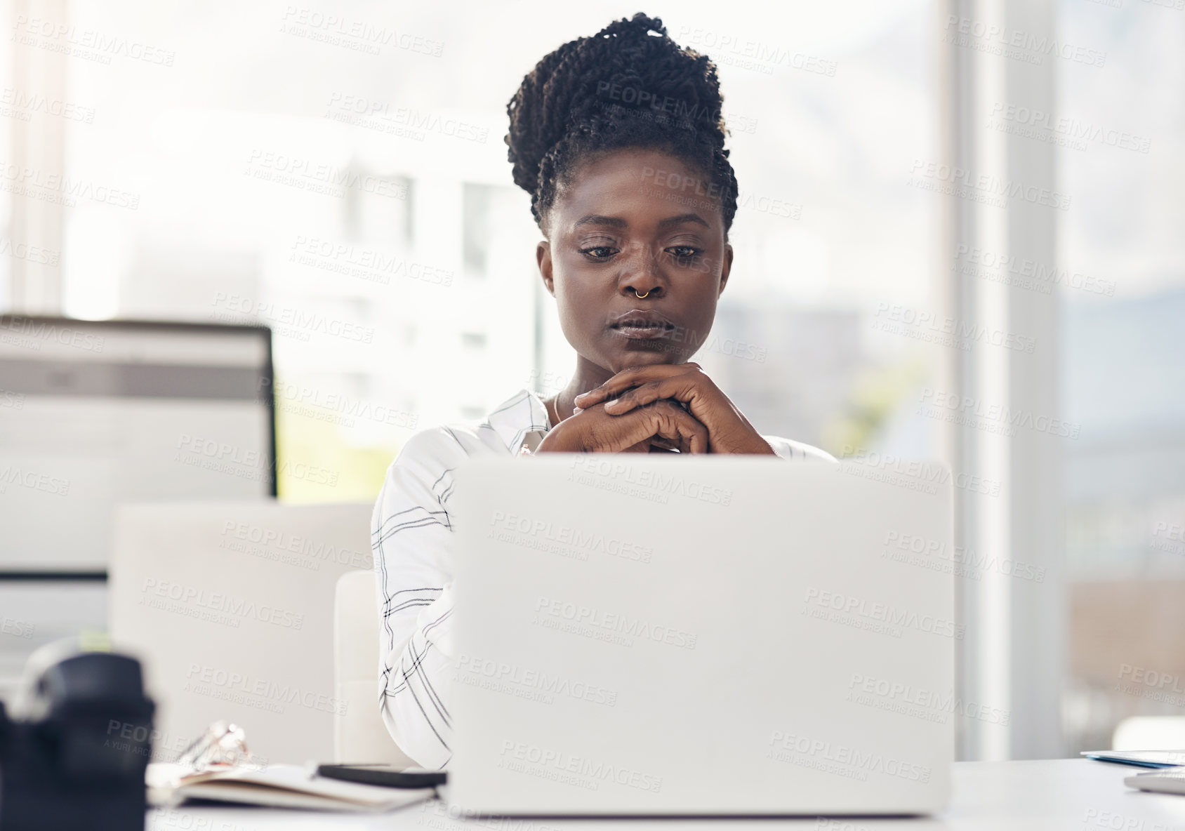 Buy stock photo Business, woman and reading on a laptop with internet in africa for entrepreneurship for a company. Professional female, computer and focus for research for working online at a startup or office.